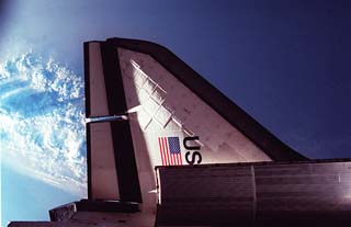 View of the Space Shuttle Atlantis as it docks to the Mir Space Station: Port wing. 